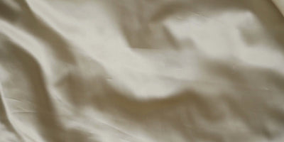 Maille signature L'Esmienne™ étoffe couture tissée Maison ESMIA Bruxelles